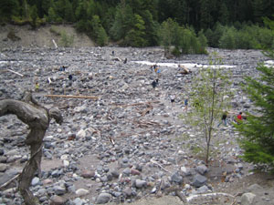 Visitors traverse Nisqually Glacier moraine